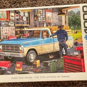 1000 pc puzzle of old blue ford truck and garage
